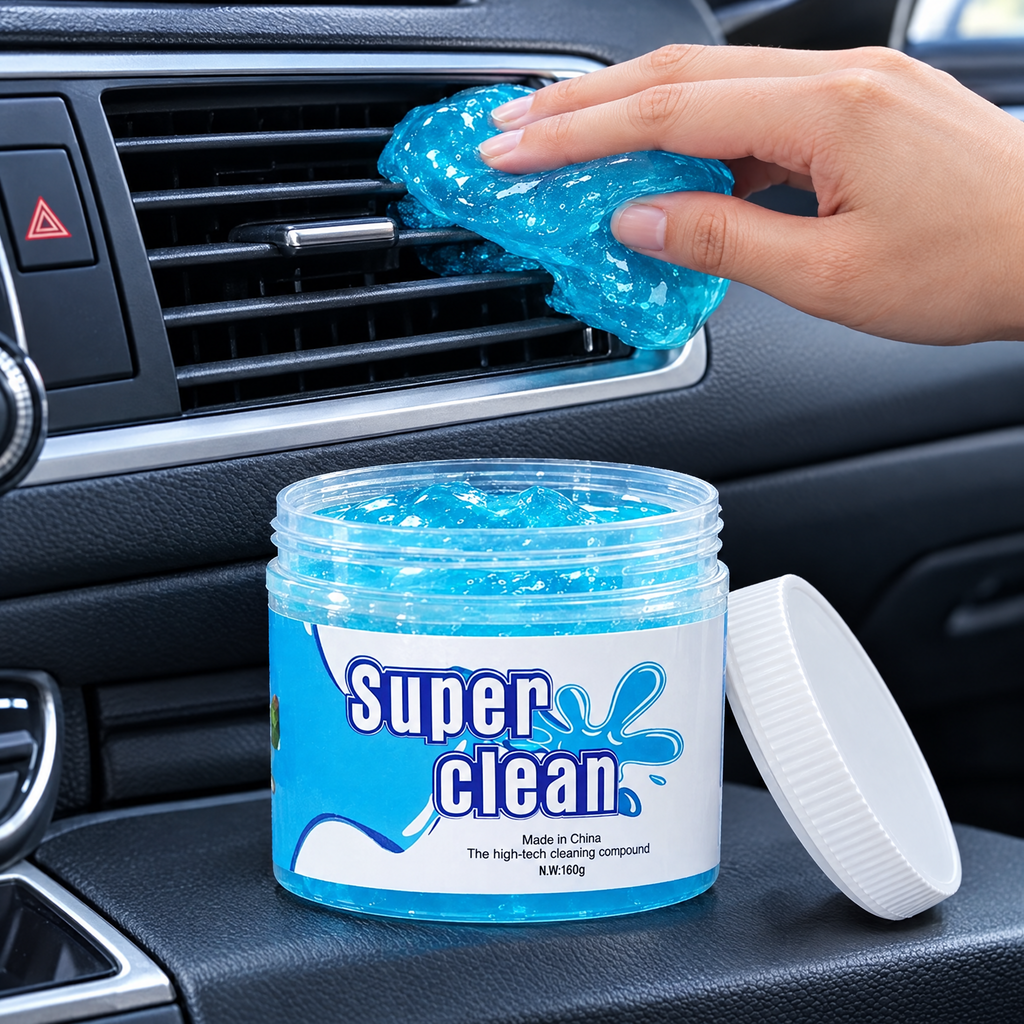 Car cleaning gel tub with gel being pressed into an air vent